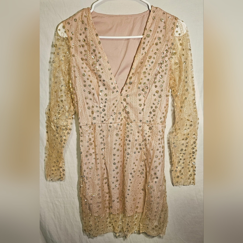Cocktail dress, it's for someone petite it's pastel pink with gold glitter